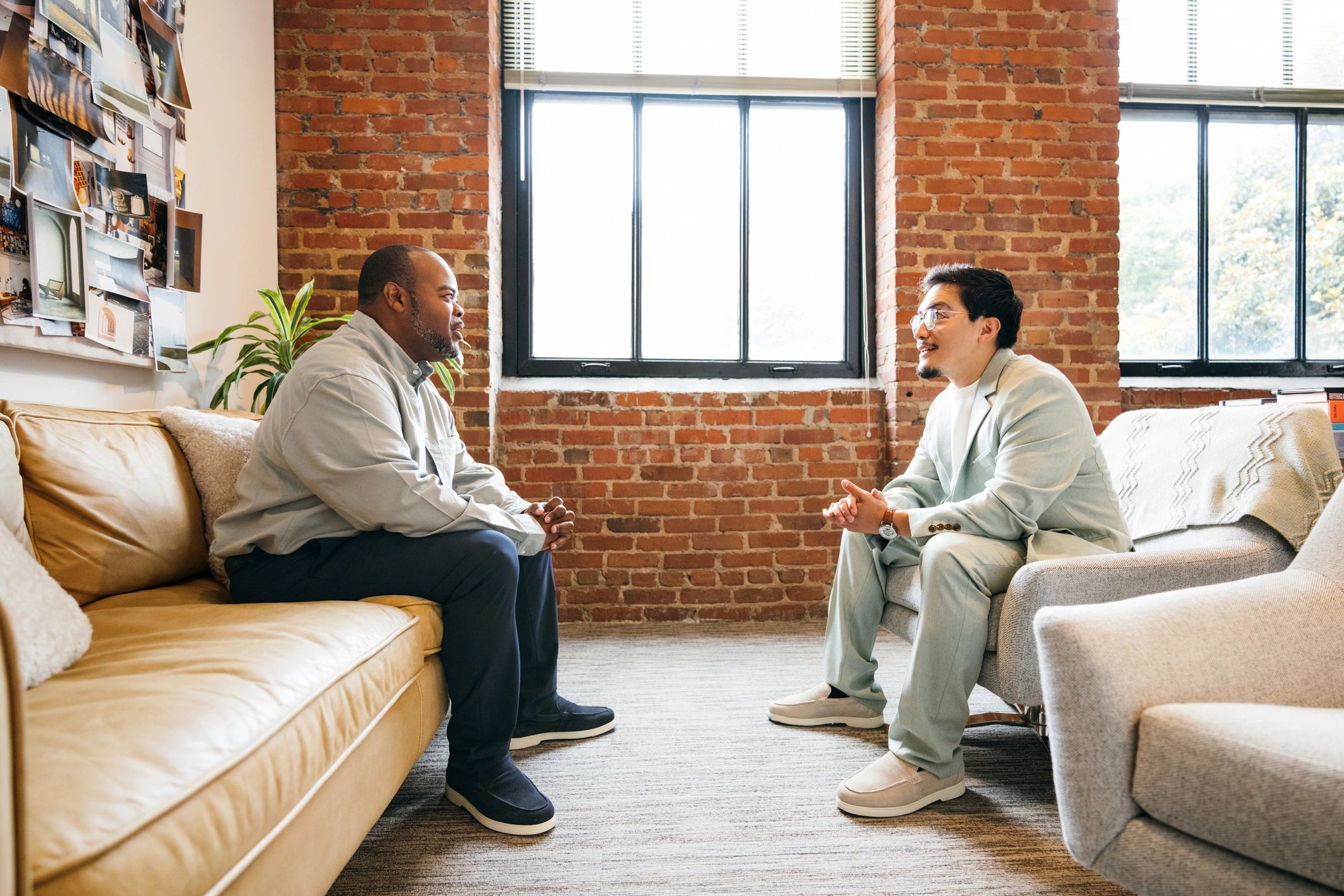 Therapist and client in a supportive counseling conversation